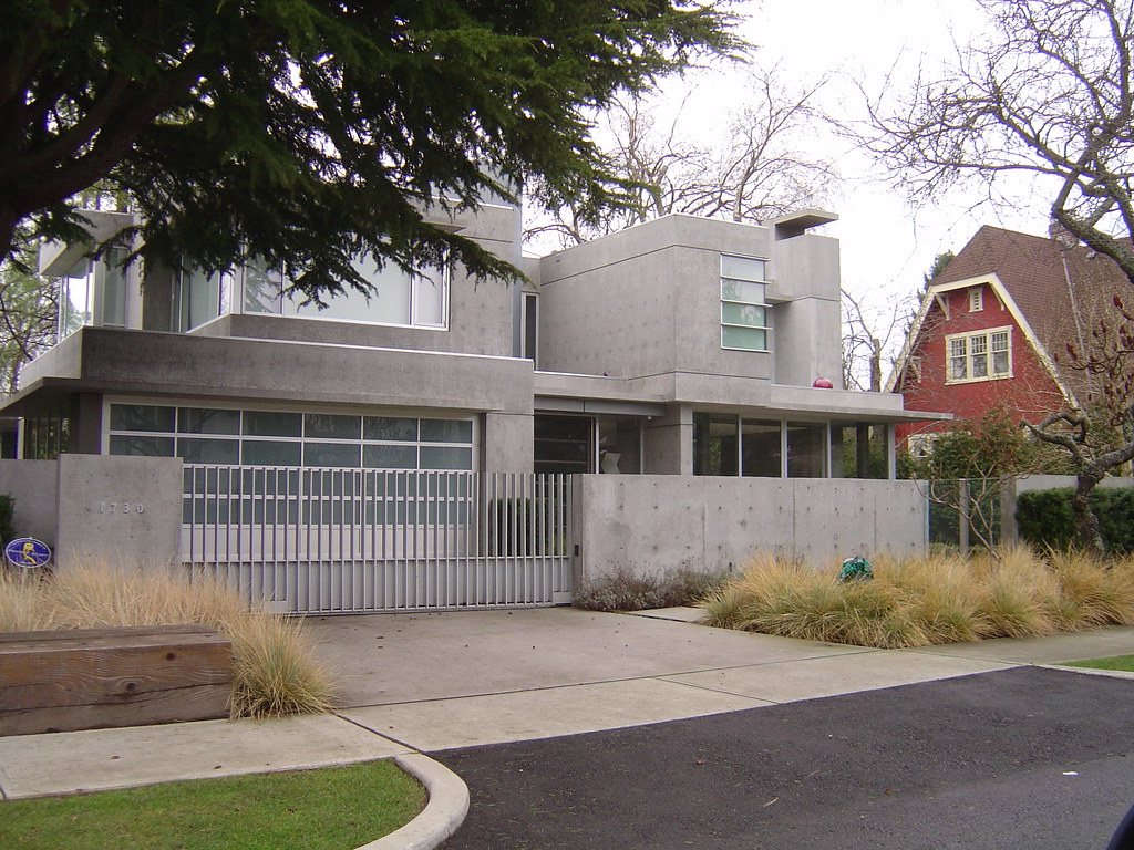 Modern grey concrete driveway and home facade